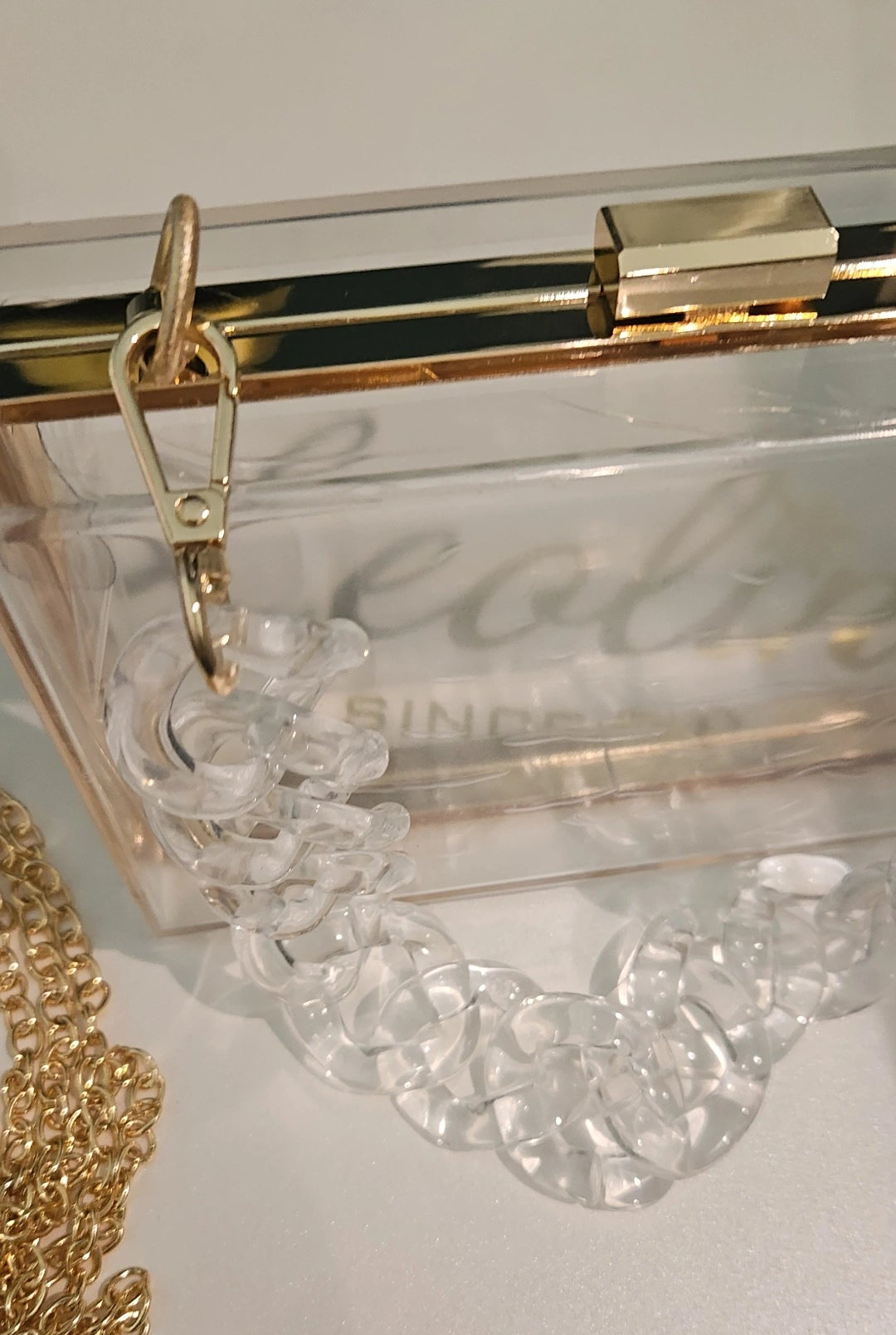Clutch see thru with clear chain